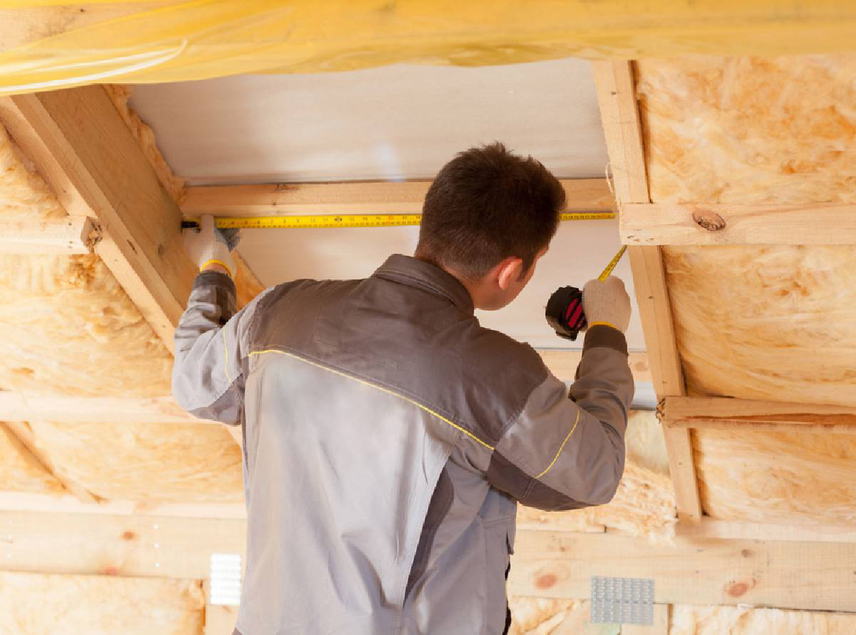 measuring window frame in a roof