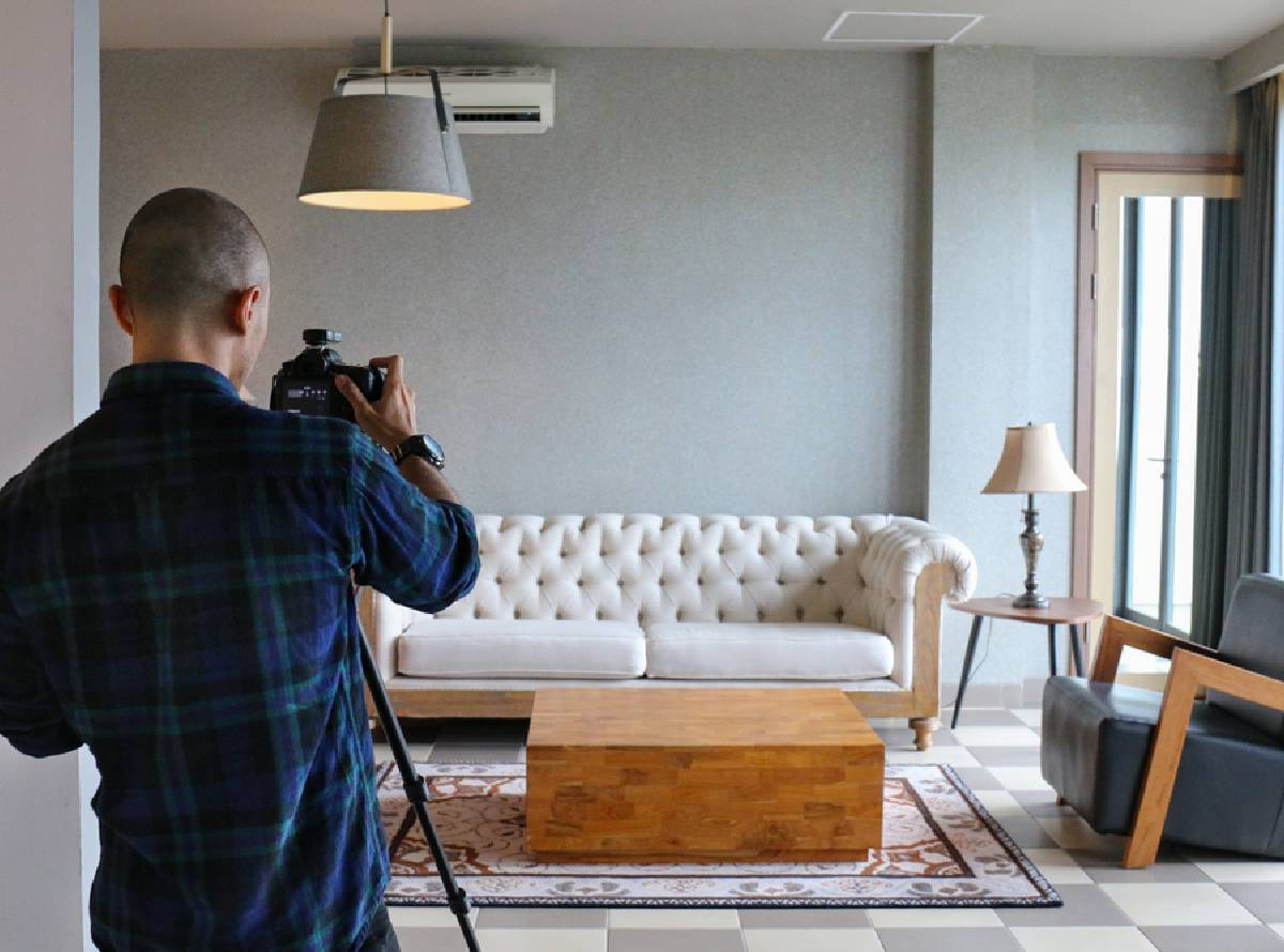 photography with camera on tripod taking photo of a living room