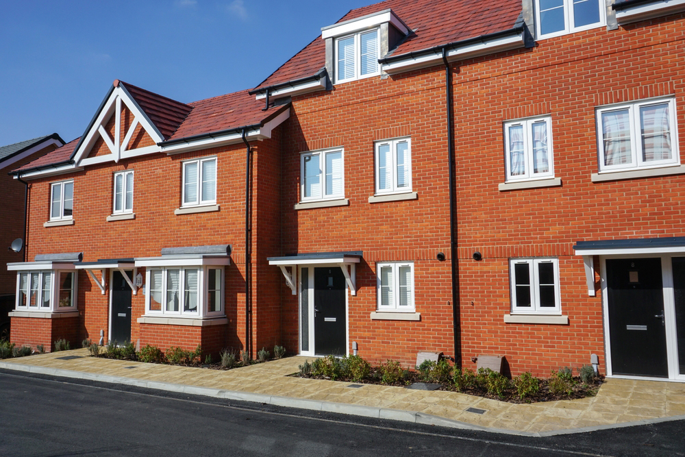 row of three modern terraced houses